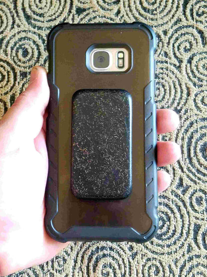 Andy's Black Sun Orgonite® Buttons protect and  shield you from harmful EMF Pollution. These Orgone Generators® are designed to fit on your cell phone case. Each Black Sun Button contains Andy's famous "Black Sun Blend"