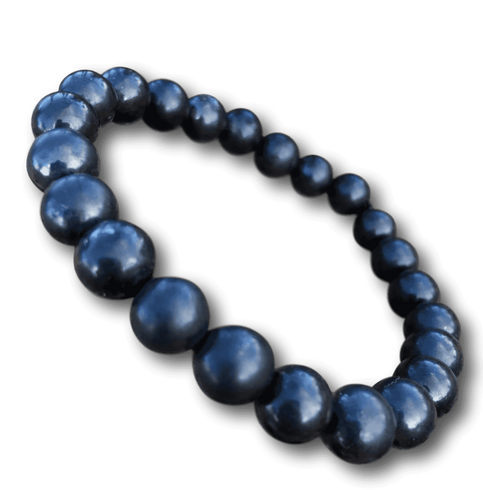 Shungite Jewelry is handmade in Karelia, Russia. This beaded bracelet has several polished 8mm round beads strung on a strong standard size elastic band